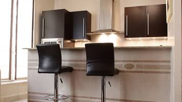 Classic Apartment | Living area | Flat-screen TV