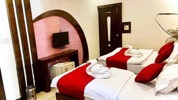 Desk, laptop workspace, free WiFi, bed sheets