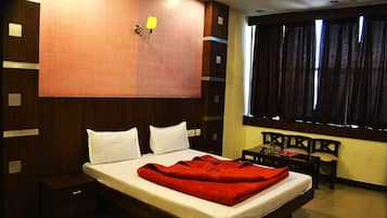 Desk, laptop workspace, free WiFi, bed sheets