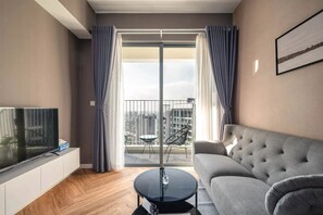 Deluxe Apartment, 2 Bedrooms, Balcony, City View | Desk, laptop workspace, free WiFi