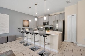 Fridge, microwave, oven, stovetop - Storey Lake Home: Pool, Gym, Lazy River & near Disney (Kissimmee)