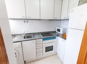 Appartement | Cuisine privée | Chaise haute