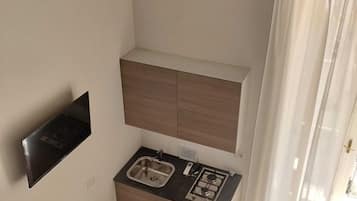 Dúplex clásico, balcón, vista a la ciudad | 1 habitación, tabla de planchar con plancha y wifi gratis