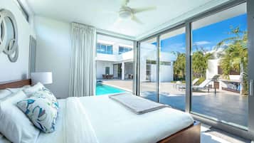 Villa, Multiple Beds, Pool Access, Ocean View (Beach Villa 5) | 3 bedrooms, individually decorated, individually furnished, bed sheets