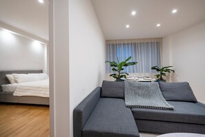 Luxury Apartment | Living area | 50-inch Smart TV with digital channels - Luxury Apartment in Bari Center (Bari)