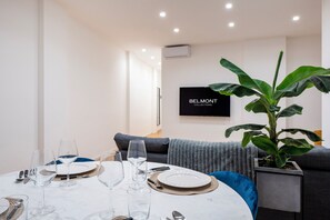 Apartamento superluxo | Área de estar | Smart TV 50 polegadas com canais digitais