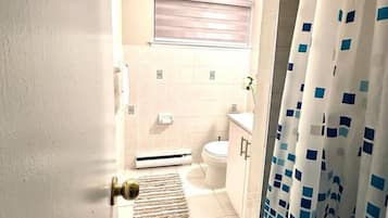 Shower, towels, soap, toilet paper