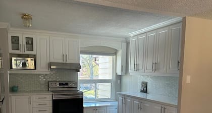 Private home with large bedroom and spacious common areas with patio.