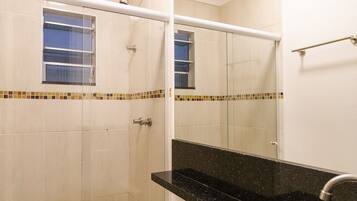 Studio | Bathroom | Shower, rainfall showerhead, hair dryer, towels