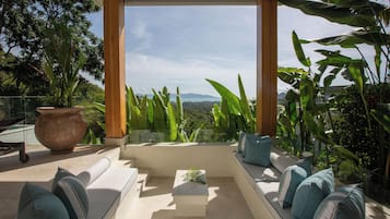 2 Bedroom Pool Villa - Banana Fan | Living area | 42-inch LED TV with satellite channels