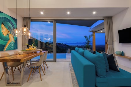 3 Bedroom Pool Villa - Frangipani | Living area | 42-inch LED TV with satellite channels