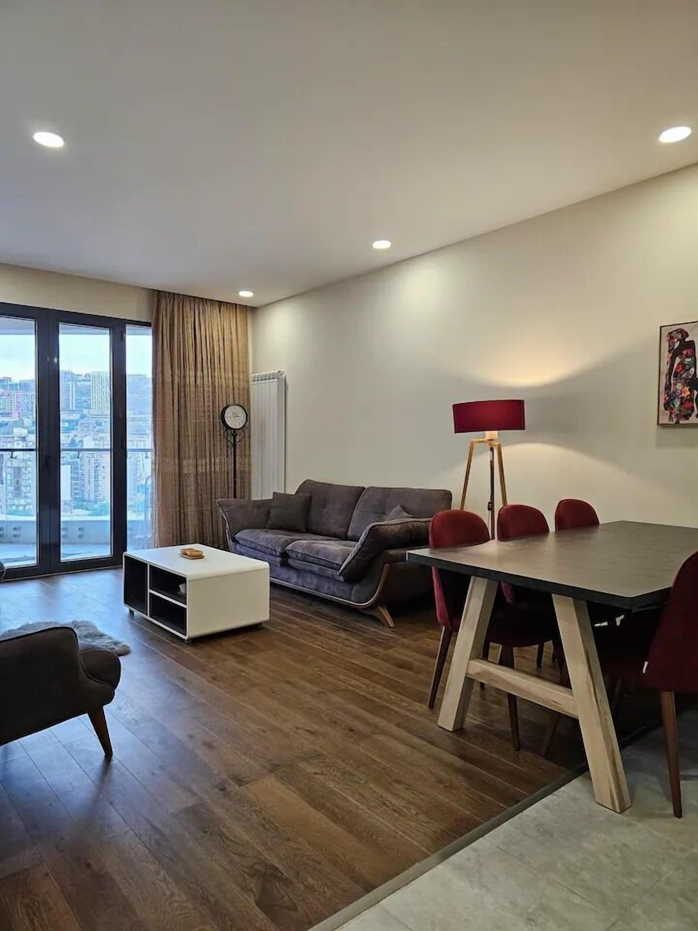 Standard Apartment, Garden View | Living area | 42-inch LCD TV with digital channels