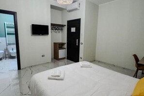 1 dormitorio, tabla de planchar con plancha, cuna de viaje y wifi gratis