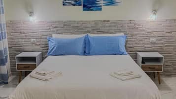 1 bedroom, desk, iron/ironing board, travel crib