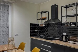 Microwave, stovetop, coffee/tea maker, electric kettle