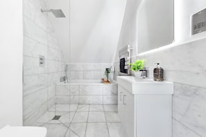 Hair dryer, towels, soap, shampoo