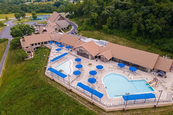 Indoor and Outdoor pools at the Owners Club appx 1.5 mile away