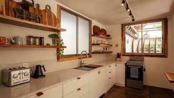 Fridge, toaster, cookware/dishes/utensils