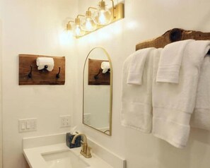 Hair dryer, towels, soap, toilet paper