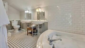 Jetted bath, hair dryer, towels, soap