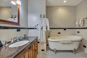 Jetted tub, hair dryer, towels, soap