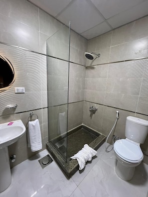Shower, shampoo, toilet paper