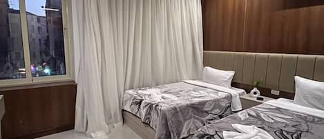 Kahden hengen deluxe-huone (yksi tai kaksi sänkyä) | Ilmainen Wi-Fi