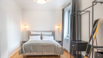 1 bedroom, desk, iron/ironing board, travel crib