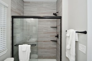 Shower, hair dryer, towels, soap