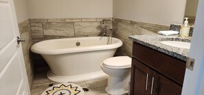 Shower, towels, soap, toilet paper