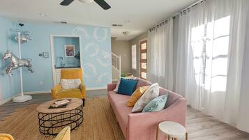 Smart TV, fireplace, table football, books