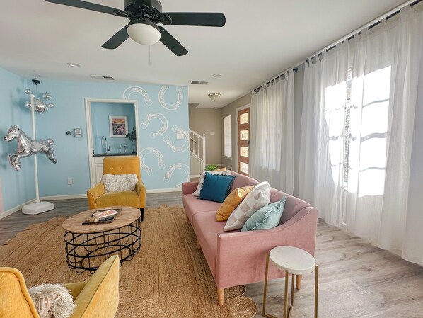 Smart TV, fireplace, table football, books