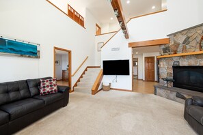 Smart TV, fireplace, books
