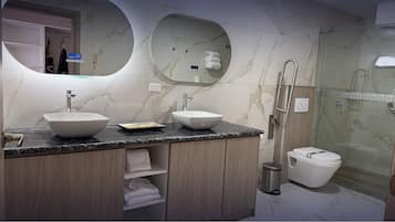 Luxury Suite, Resort View | Bathroom | Shower, hair dryer, slippers, towels