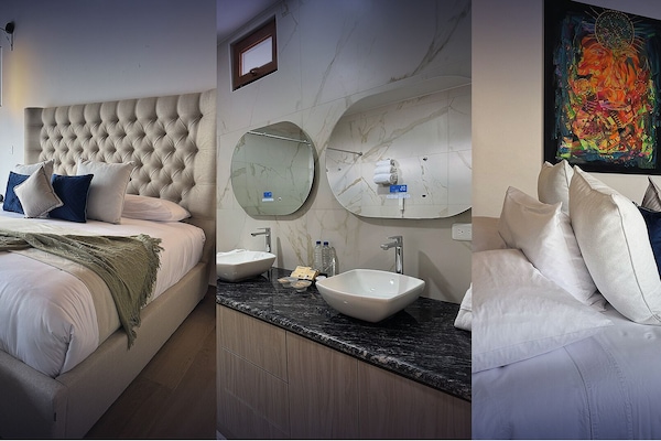 Suite, 1 cama King size, acceso para personas con movilidad reducida, vista al resort | Caja de seguridad en la habitación, escritorio y cortinas blackout