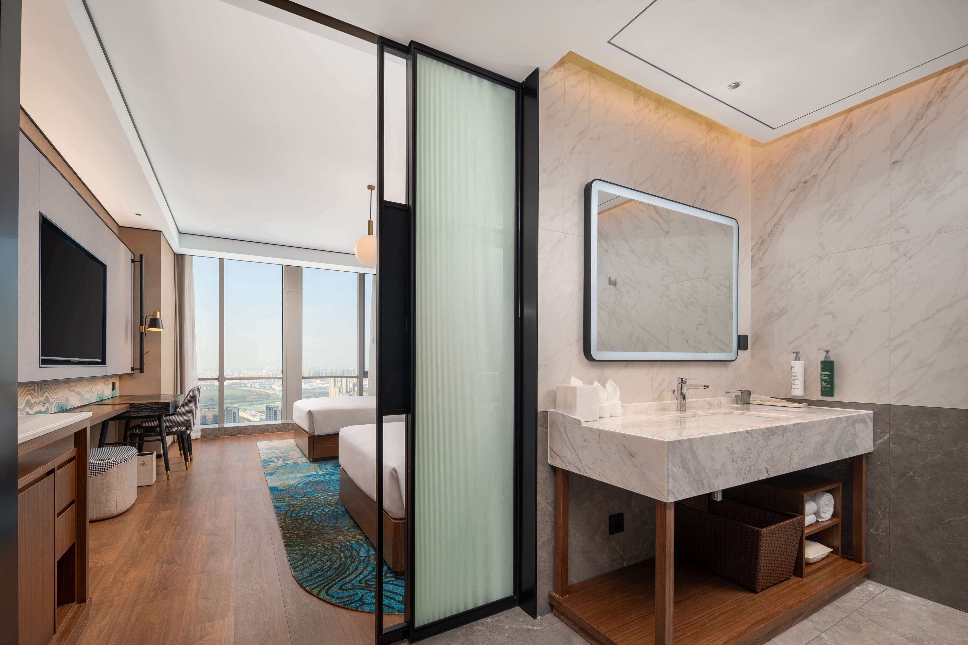 Deluxe Room, 2 Single Beds | Bathroom | Rainfall showerhead, towels