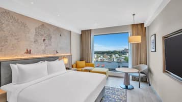 Premium bedding, down comforters, memory foam beds, in-room safe