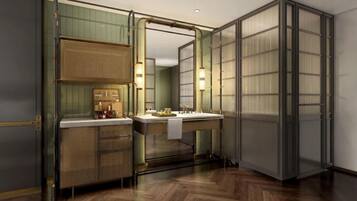 A modern bathroom with a large mirror, a sink, and a cabinet.