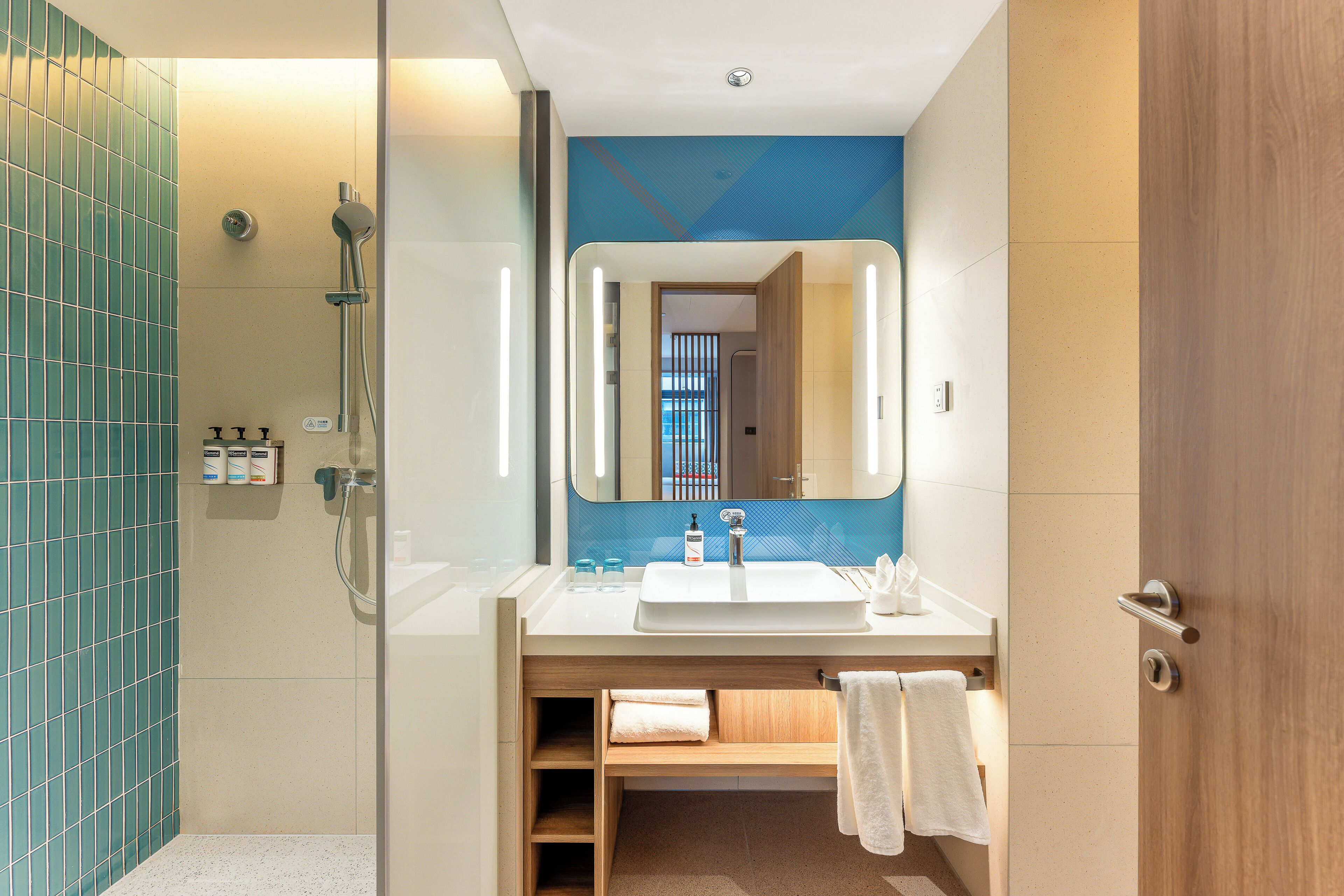 Shower, free toiletries, hair dryer, slippers