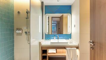 Shower, free toiletries, hair dryer, slippers
