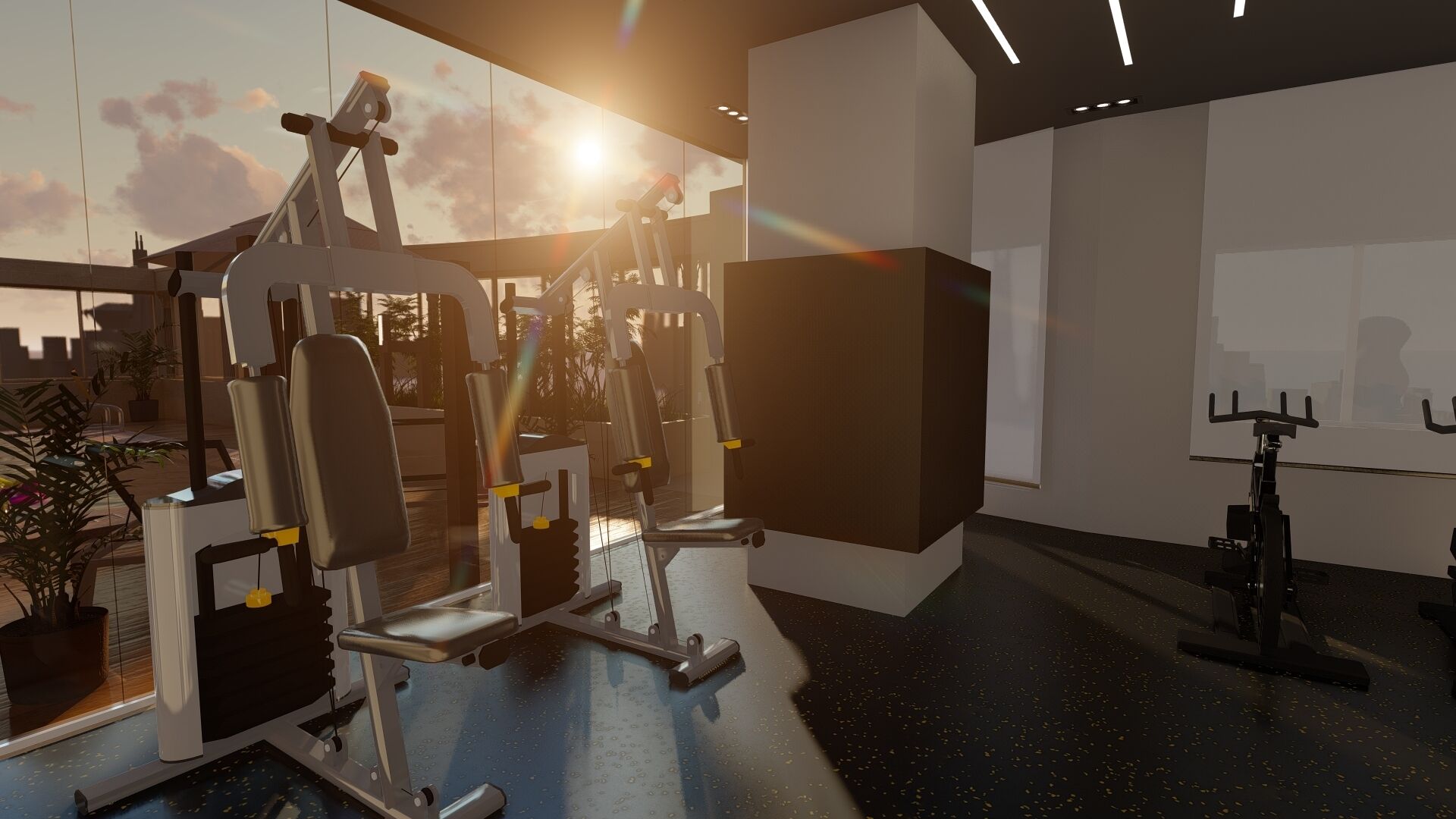 A gym with exercise equipment, a large window, and a view of the sky.