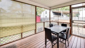 A covered patio with a table and chairs, a wooden deck, and a view of a backyard with a fence and a house. - 3 Mi to Huntington Beach: Hampton Family Home! (Hampton)
