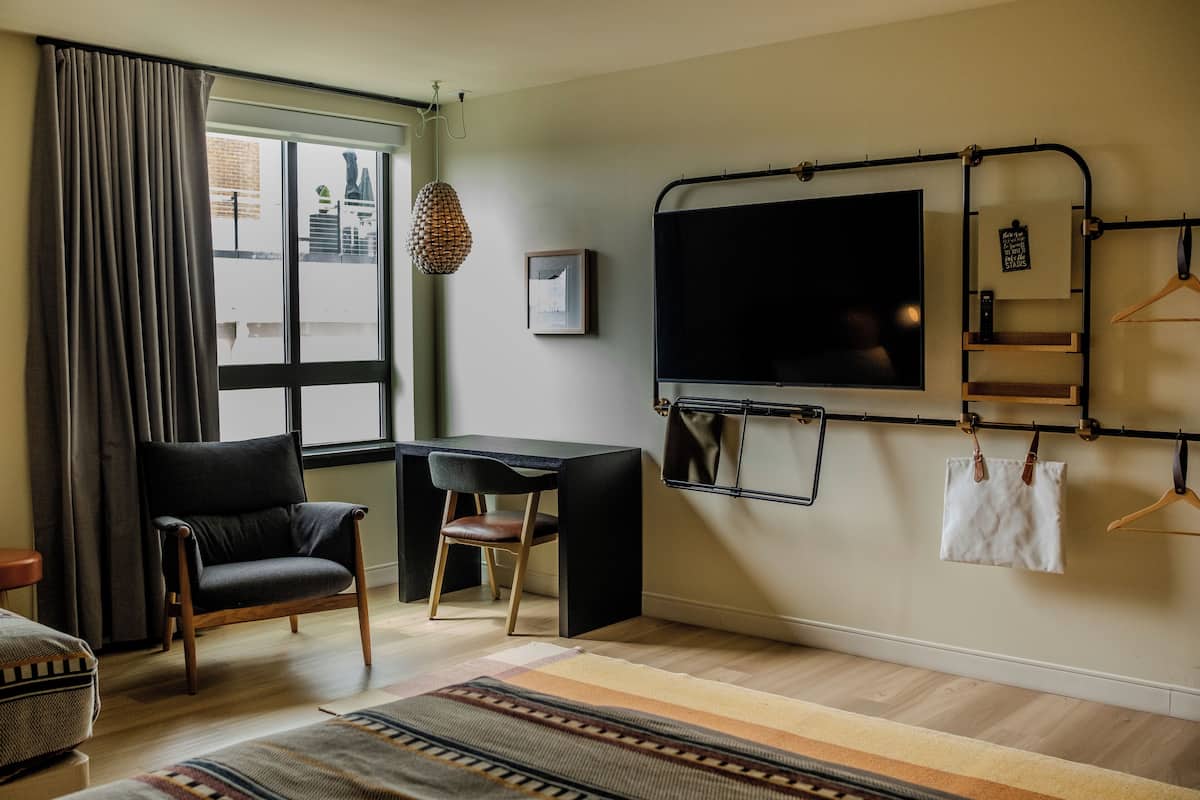 Desk, laptop workspace, blackout curtains, soundproofing