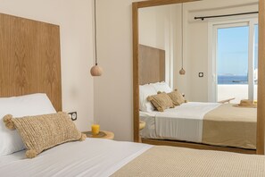 Deluxe-huoneisto | Ylelliset vuodevaatteet, minibaari, tallelokero huoneessa