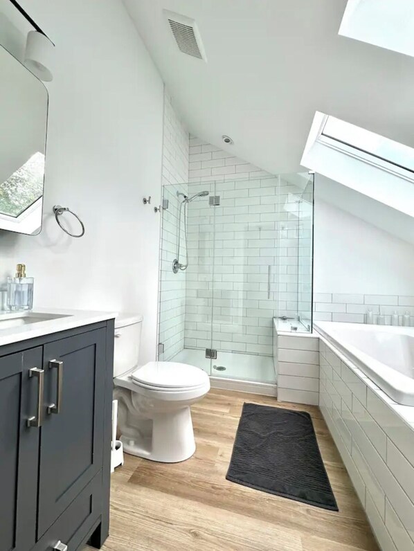 Shower, hair dryer, towels, soap