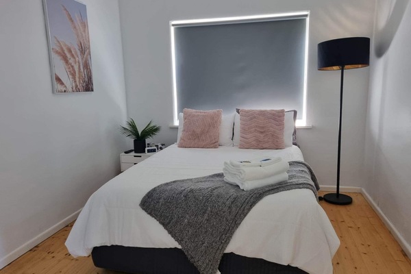 Bedroom 2 with flat screen tv Netflix and split system heating and cooling