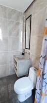 Basic Room, Balcony, Garden View | Bathroom | Free toiletries, towels, soap, toilet paper