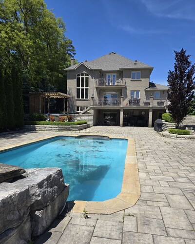 "Luxury Home with Pool and Outdoor Bar"