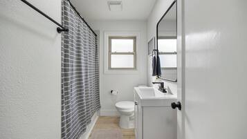 Hair dryer, towels, soap, toilet paper