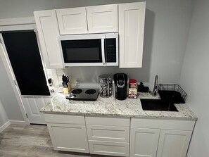 Fridge, microwave, coffee/tea maker, blender